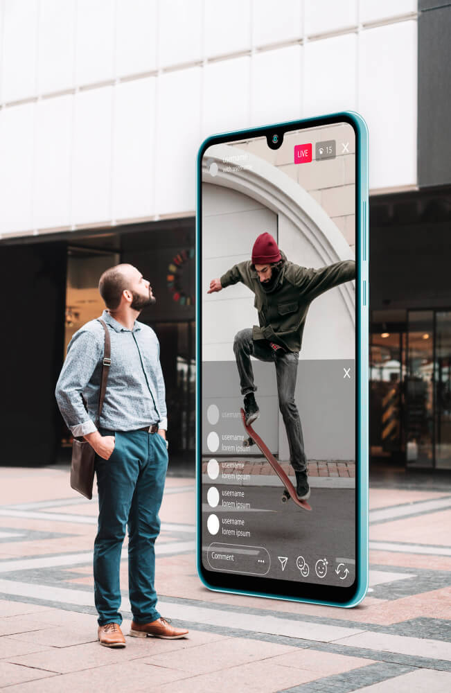 Man standing with smartphone, screen displaying play button for reels